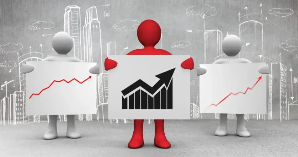 Three people holding up a chart with a graph on it, illustrating data analysis and collaboration.