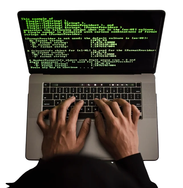 Hands typing on laptop symbolising affordable website care and hosting services for small businesses